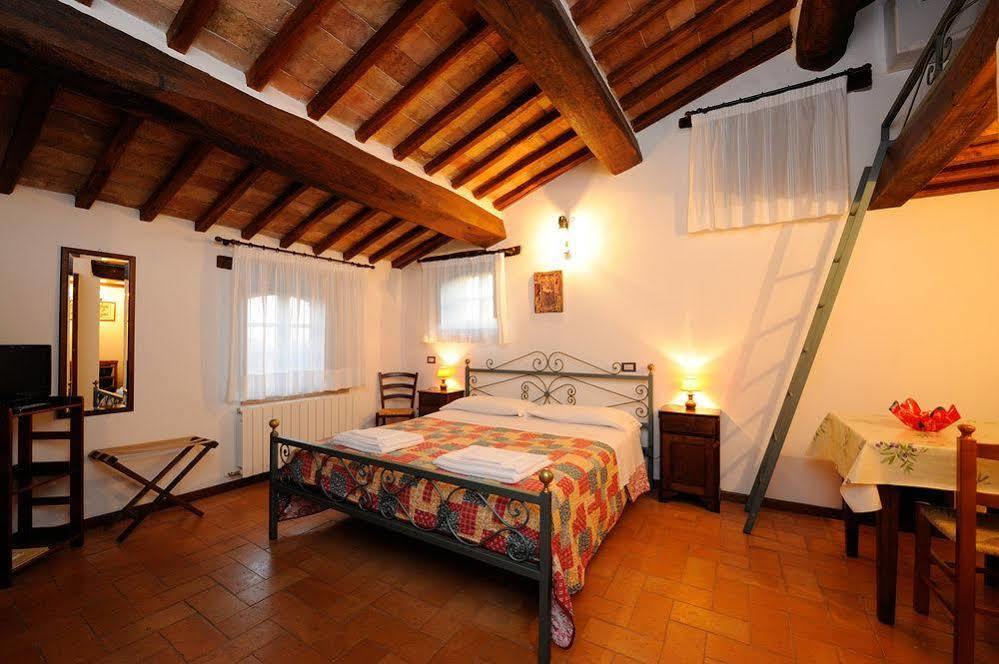 Отель Relais Borgo Torale Пассиньяно-суль-Тразимено Экстерьер фото